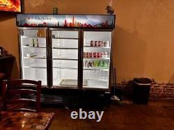 Dukers 3 Door Commercial Display Merchandiser Refrigerator, Retails $6,200